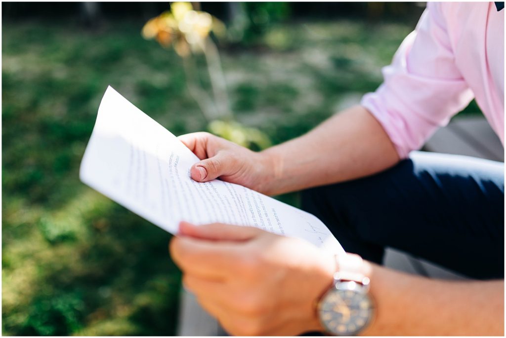 groom reading letter from his bride