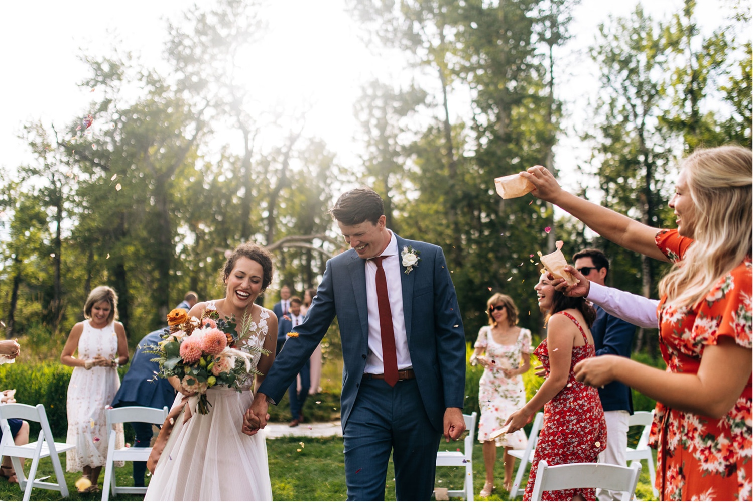 bride and groom leave intimate wedding ceremony