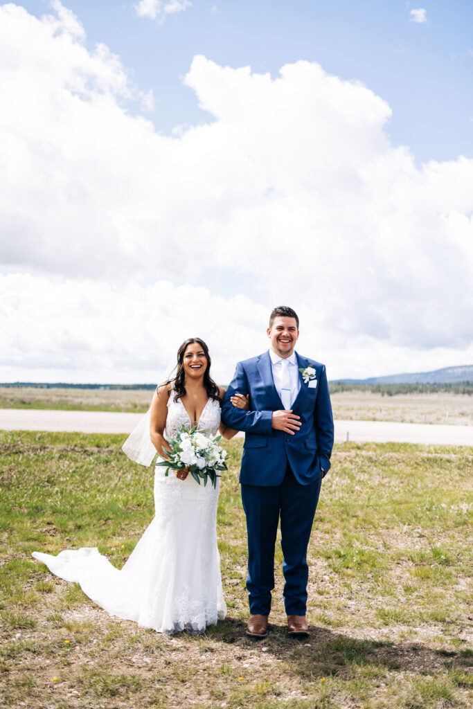 A bride and groom waiting for their intimate destination elopement vow ceremony to begin